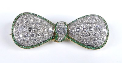 Lot 1160 - A yellow and white metal, emerald and diamond...