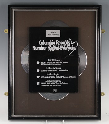 Lot 719 - Paul McCartney, a signed presentation, four...
