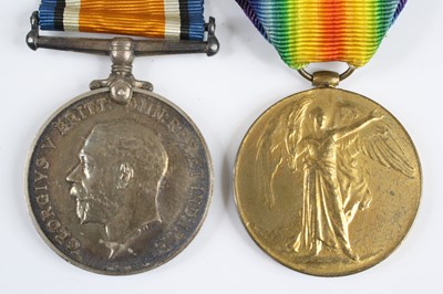 Lot 3230 - A WW I British War and Victory pair, naming...