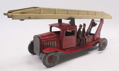 Lot 1914 - A tinplate and clockwork Mettoy fire engine...