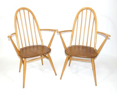 Lot 353 - A pair of Ercol blond elm and beech 'Quaker'...