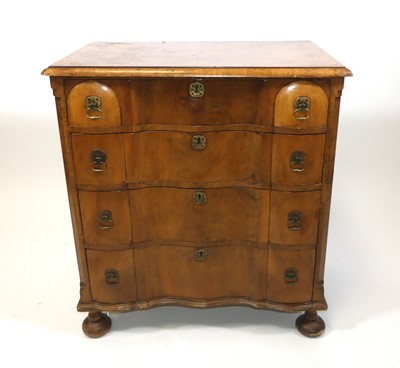 Lot 1376 - A walnut and figured walnut chest in the early...