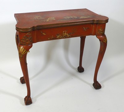 Lot 1427 - A Japan red lacquered card table in the...