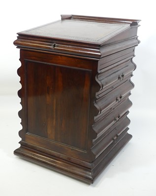 Lot 1383 - A circa 1830 rosewood slide-top davenport of...