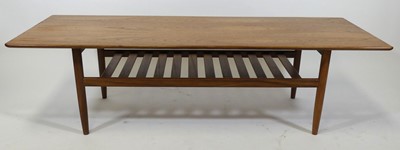Lot 346 - A 1960s G-Plan teak long coffee table, having...