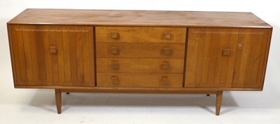 Lot 375 - A 1960s British elm 'Ensign' sideboard by...