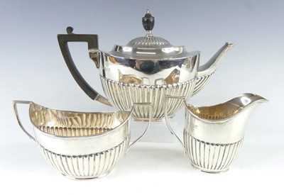 Lot 1131 - An Edwardian silver three-piece tea set,...