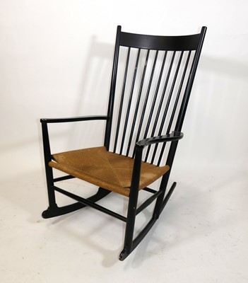 Lot 386 - After a design by Hans Wegner for Møbler - a...