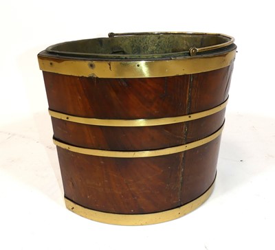 Lot 1435 - An Irish Regency mahogany and brass bound peat...