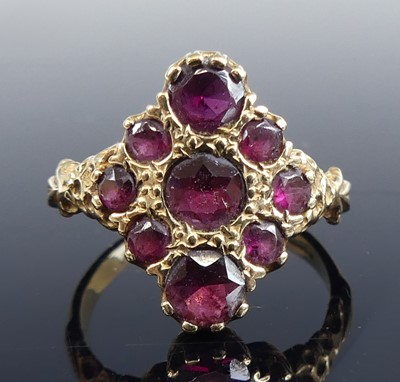 Lot 2502 - A 9ct yellow gold garnet navette shaped...