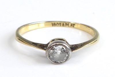 Lot 2503 - A yellow and white metal diamond solitaire...