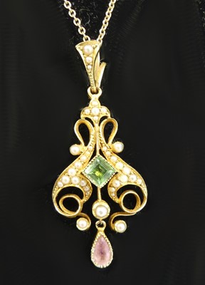 Lot 2505 - An Edwardian yellow metal openwork pendant,...