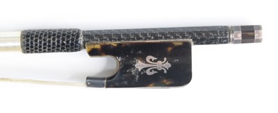 Lot 595 - A violin / cello bow, having a tortoiseshell...