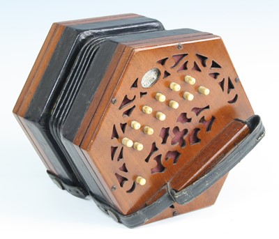 Lot 599 - A late Victorian concertina, of typical...