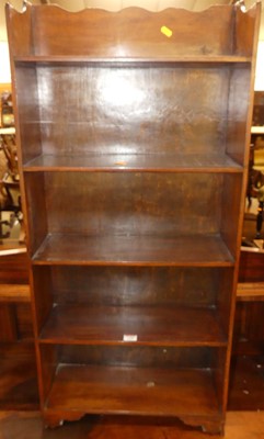 Lot 1188 - An early 20th century walnut narrow...