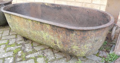 Lot 1411 - A pair of large cast iron garden planters by...