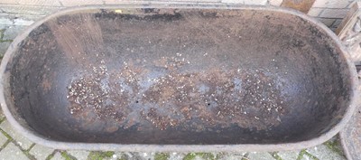 Lot 1411 - A pair of large cast iron garden planters by...