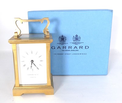 Lot 571 - A 20th century lacquered brass carriage clock...