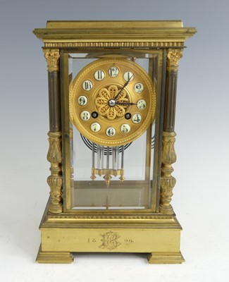Lot 1356 - A late 19th century lacquered brass four-glass...