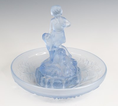 Lot 58 - A French Art Deco moulded and frosted blue...