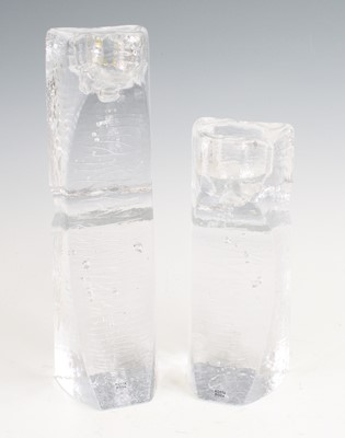 Lot 82 - A pair of heavy moulded glass candlesticks by...