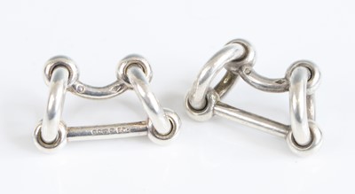 Lot 109 - A pair of Hermès silver cufflinks, each of...