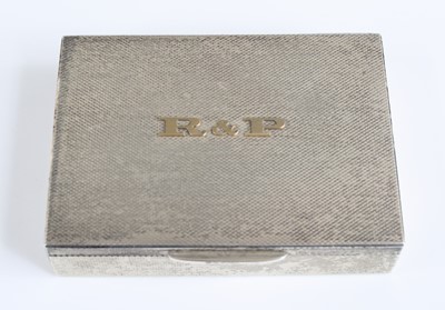 Lot 102 - A 1980s silver pocket cigarette case, having...