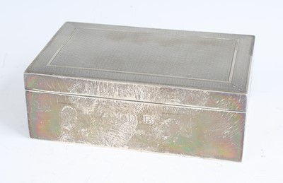 Lot 103 - An Art Deco silver table cigarette box, having...