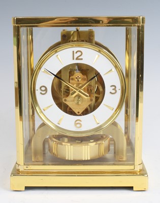 Lot 143 - Jaeger Le Coultre - a gilt brass cased and...