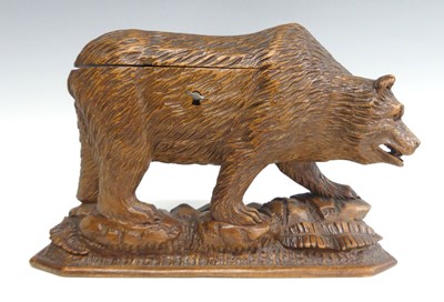 Lot 1249 - A late 19th century Black Forest carved bear...