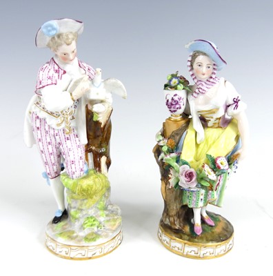 Lot 1079 - A pair of Jacob Petit porcelain figures of a...