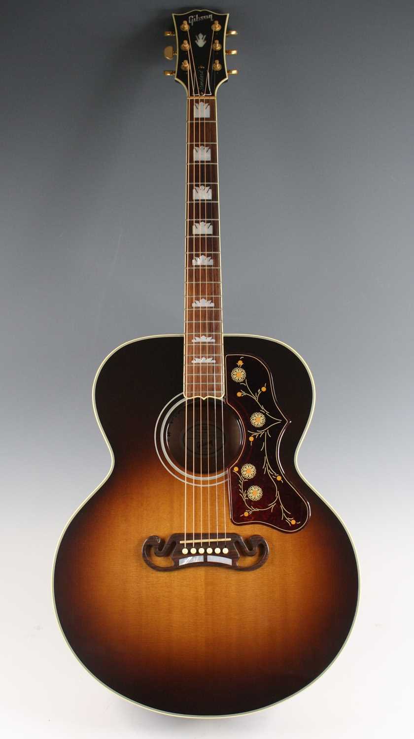 Lot 586 - A Gibson Standard SJ-200 electro acoustic...