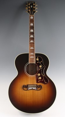 Lot 586 - A Gibson Standard SJ-200 electro acoustic...