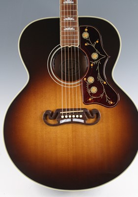 Lot 586 - A Gibson Standard SJ-200 electro acoustic...