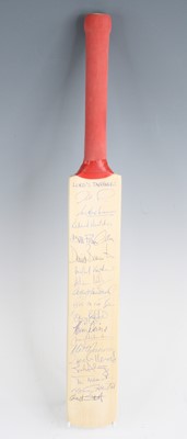 Lot 844 - A souvenir miniature cricket bat for the match...