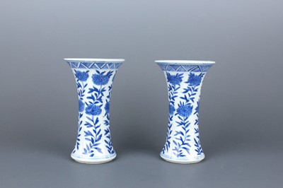 Lot 2039 - A pair of Chinese blue and white gu vases,...