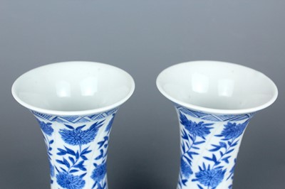 Lot 2039 - A pair of Chinese blue and white gu vases,...
