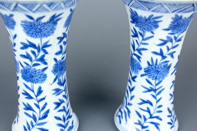 Lot 2039 - A pair of Chinese blue and white gu vases,...