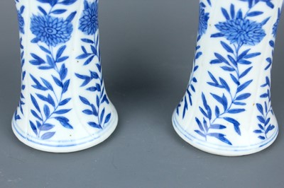 Lot 2039 - A pair of Chinese blue and white gu vases,...