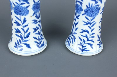 Lot 2039 - A pair of Chinese blue and white gu vases,...