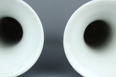 Lot 2039 - A pair of Chinese blue and white gu vases,...