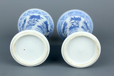 Lot 2039 - A pair of Chinese blue and white gu vases,...