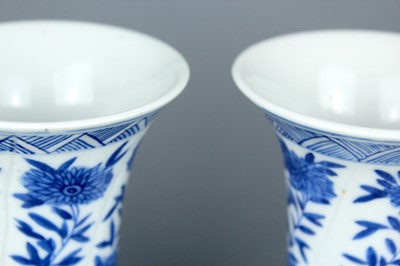 Lot 2039 - A pair of Chinese blue and white gu vases,...