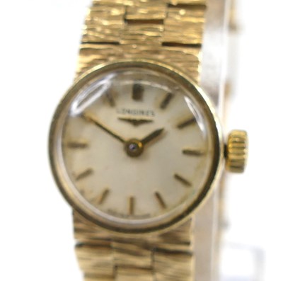 Lot 1211 - A lady's Longines 9ct gold cased bracelet...