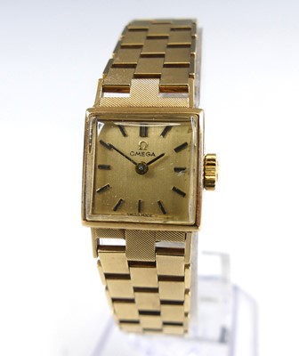 Lot 1208 - An Omega lady's 9ct gold bracelet watch,...