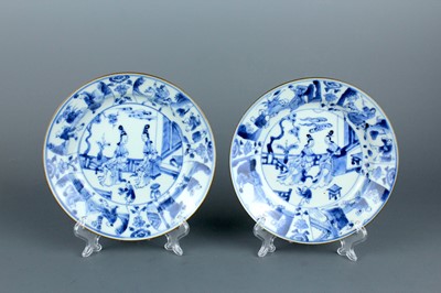 Lot 2119 - A pair of Chinese blue and white saucers, Qing...