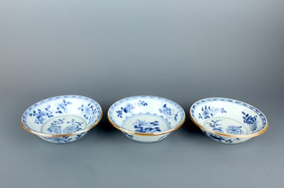 Lot 2118 - Three Chinese blue and white ‘floral’ shallow...