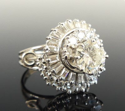 Lot 1199 - A white metal diamond cocktail ring,...
