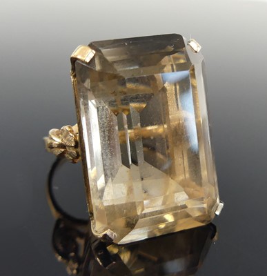 Lot 1165 - A yellow metal dress ring, having a...