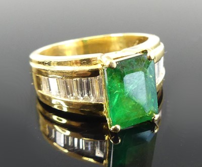 Lot 1186 - A yellow metal synthetic emerald and diamond...